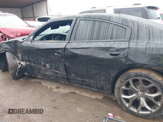 2015 Dodge Charger SXT z VIN 2C3CDXHG3FH754224, wystawiony jako IAAI lot #41527488 z przebiegiem 162 116 mil mil oraz . Historia ofert i sprzedaży dostępna na DreamBid. Obrazek 14.