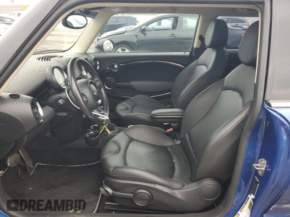 2012 MINI Hardtop S with VIN WMWSV3C56CTY17072, listed as a Copart auction lot 58275165 with 101,542 mi miles and Salvage title. Bid and sale history available at DreamBid. Image 7.