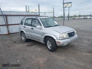 2000 Suzuki Grand Vitara JLX with VIN JS3TD62V5Y4117740, listed as a IAAI auction lot 42088696 with 166,484 mi miles. Bid and sale history available at carsss.com. Image 1.
