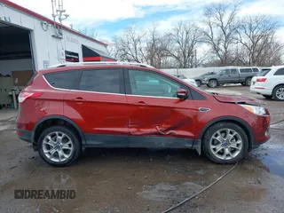 2014 Ford Escape Titanium with VIN 1FMCU9J92EUE01077, listed as a IAAI auction lot 41642337 with 26,002 mi miles. Bid and sale history available at carsss.com. Image 13.