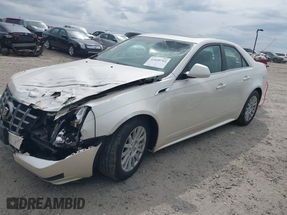 2012 Cadillac CTS Luxury with VIN 1G6DF5E55C0127450, listed as a IAAI auction lot 42020764 with 150,597 mi miles and . Bid and sale history available at DreamBid. Image 2.