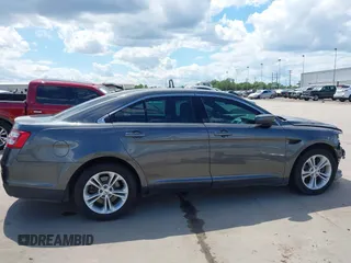 2018 Ford Taurus SEL z VIN 1FAHP2E81JG111809, wystawiony jako IAAI lot #42228720 z przebiegiem 83 532 mil mil oraz . Historia ofert i sprzedaży dostępna na DreamBid. Obrazek 14.