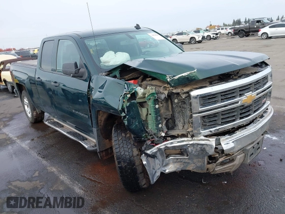 2014 Chevrolet Silverado 1500 LT with VIN 1GCVKREC7EZ312679, listed as a IAAI auction lot 40874395 with 153,234 mi miles and . Bid and sale history available at DreamBid. Image 1.