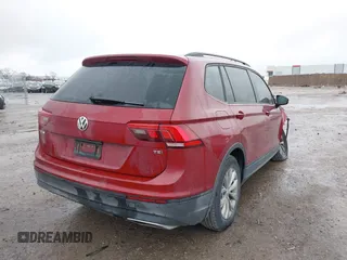 2018 Volkswagen Tiguan S with VIN 3VV1B7AX8JM124827, listed as a IAAI auction lot 41544321 with 101,492 mi miles and . Bid and sale history available at DreamBid. Image 4.