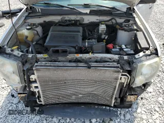 2011 Ford Escape XLT z VIN 1FMCU9DG8BKA85654, wystawiony jako Copart lot #64616925 z przebiegiem 188 948 mil mil oraz Szkoda całkowita • Salvage title. Historia ofert i sprzedaży dostępna na DreamBid. Obrazek 12.