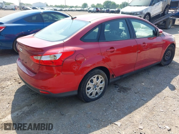 2012 Ford Focus SE with VIN 1FAHP3F24CL102709, listed as a IAAI auction lot 42491457 with 206,229 mi miles and . Bid and sale history available at DreamBid. Image 4.
