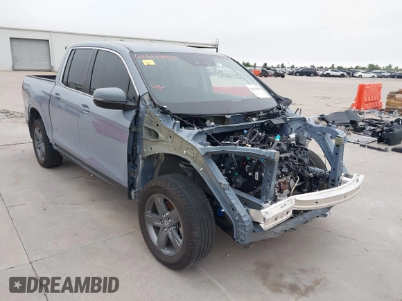 2023 Honda Ridgeline RTL with VIN 5FPYK3F58PB047099, listed as a IAAI auction lot 42313390 with Not provided miles and . Bid and sale history available at DreamBid. Image 1.
