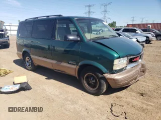 2001 GMC Safari with VIN 1GKDM19W71B511332, listed as a Copart auction lot 56097624 with 124,493 mi miles and Salvage Title. Bid and sale history available at carsss.com. Image 4.