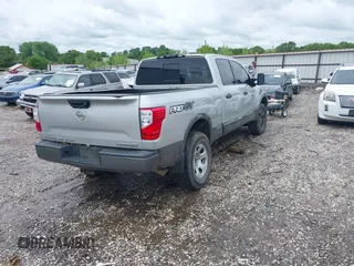 2017 Nissan Titan Pro-4X z VIN 1N6BA1F45HN529090, wystawiony jako IAAI lot #42163486 z przebiegiem 162 226 mil mil oraz . Historia ofert i sprzedaży dostępna na DreamBid. Obrazek 4.