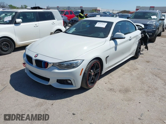 2015 BMW 4 Series 428i z VIN WBA3V7C52FP771779, wystawiony jako IAAI lot #41953647 z przebiegiem 66 003 mil mil oraz . Historia ofert i sprzedaży dostępna na DreamBid. Obrazek 17.