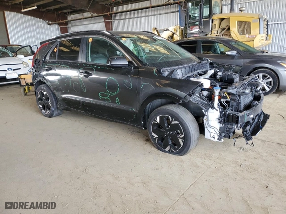 2023 Kia Niro EV Wind with VIN KNDCR3L12P5029800, listed as a Copart auction lot 49516985 with 8,966 mi miles and Salvage Title. Bid and sale history available at carsss.com. Image 4.
