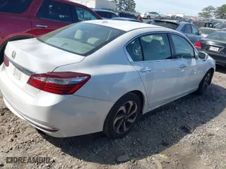 2016 Honda Accord Sedan EX with VIN 1HGCR2F74GA147768, listed as a IAAI auction lot 41907451 with 242,854 mi miles. Bid and sale history available at carsss.com. Image 4.
