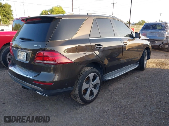 2016 Mercedes-Benz GLE 350 with VIN 4JGDA5HB4GA601560, listed as a IAAI auction lot 42527776 with 100,418 mi miles and . Bid and sale history available at DreamBid. Image 4.