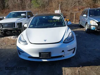 2018 Tesla Model 3 Long Range Battery with VIN 5YJ3E1EB5JF108633, listed as a IAAI auction lot 41016970 with 90,175 mi miles and . Bid and sale history available at DreamBid. Image 12.