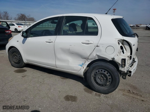 2009 Toyota Yaris with VIN JTDKT903495224256, listed as a Copart auction lot 50065565 with 164,473 mi miles and Salvage Title. Bid and sale history available at carsss.com. Image 2.