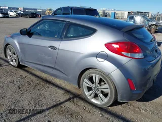 2017 Hyundai Veloster with VIN KMHTC6AD9HU323472, listed as a IAAI auction lot 41865974 with 94,692 mi miles. Bid and sale history available at carsss.com. Image 3.