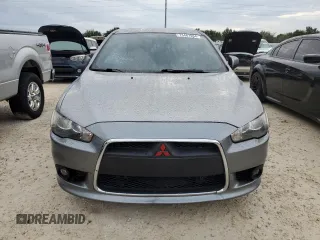 2013 Mitsubishi Lancer GT with VIN JA32U8FW9DU010787, listed as a Copart auction lot 73481664 with 142,188 mi miles and Salvage Title. Bid and sale history available at carsss.com. Image 5.
