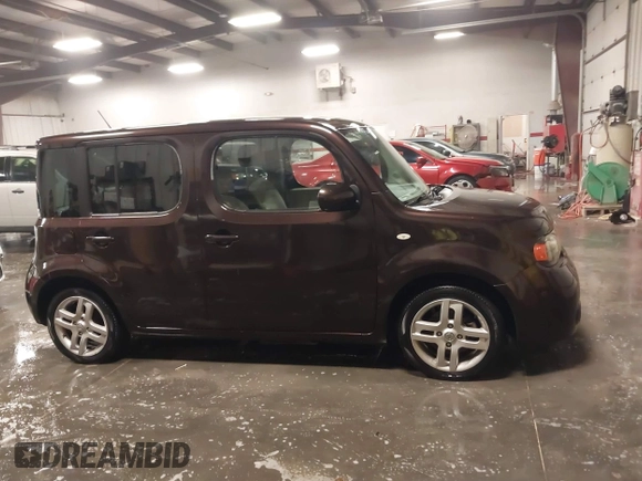 2009 Nissan Cube S z VIN JN8AZ28R39T124465, wystawiony jako IAAI lot #40769739 z przebiegiem 145 993 mil mil oraz . Historia ofert i sprzedaży dostępna na DreamBid. Obrazek 13.