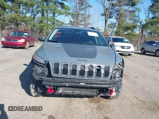2014 Jeep Cherokee Trailhawk with VIN 1C4PJMBS4EW179763, listed as a IAAI auction lot 41988048 with 152,681 mi miles. Bid and sale history available at carsss.com. Image 13.