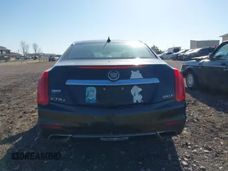 2014 Cadillac CTS Luxury AWD z VIN 1G6AX5SX9E0177017, wystawiony jako IAAI lot #42038429 z przebiegiem 113 656 mil mil oraz . Historia ofert i sprzedaży dostępna na DreamBid. Obrazek 16.