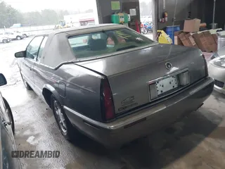 1999 Cadillac Eldorado ESC z VIN 1G6EL12Y8XU612393, wystawiony jako IAAI lot #41761839 z przebiegiem 104 994 mil mil oraz . Historia ofert i sprzedaży dostępna na DreamBid. Obrazek 3.
