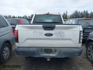 2019 Ford F-150 XL with VIN 1FTMF1CB7KKD57301, listed as a IAAI auction lot 41911127 with 80,928 mi miles. Bid and sale history available at carsss.com. Image 6.