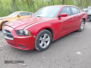 2014 Dodge Charger SE with VIN 2C3CDXBG6EH172058, listed as a IAAI auction lot 42227390 with 174,148 mi miles and . Bid and sale history available at carsss.com. Image 18.