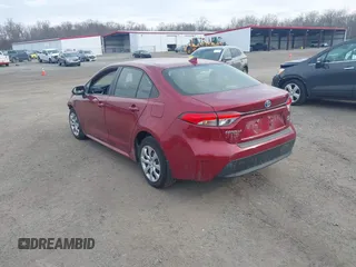 2023 Toyota Corolla Hybrid LE with VIN JTDBCMFE2PJ003738, listed as a IAAI auction lot 41620152 with 4,926 mi miles. Bid and sale history available at carsss.com. Image 3.