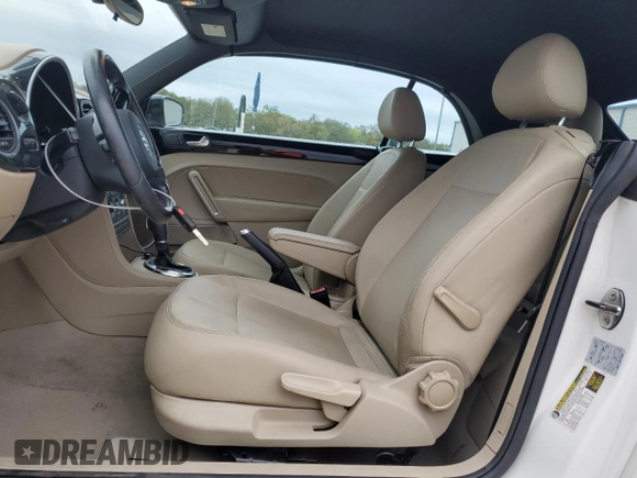 2013 Volkswagen Beetle with VIN 3VW7S7AT9DM816943, listed as a Copart auction lot 88466695 with 77,265 mi miles and Salvage Title. Bid and sale history available at DreamBid. Image 7.