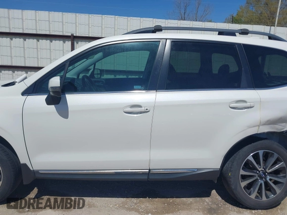 2017 Subaru Forester Touring with VIN JF2SJGWC2HH432944, listed as a IAAI auction lot 41834284 with 109,549 mi miles. Bid and sale history available at carsss.com. Image 15.