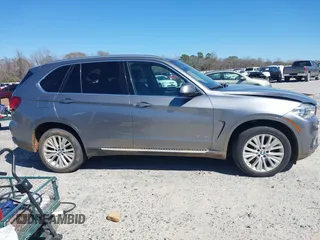 2016 BMW X5 xDrive40e z VIN 5UXKT0C50G0F75010, wystawiony jako IAAI lot #41732410 z przebiegiem 88 671 mil mil oraz . Historia ofert i sprzedaży dostępna na DreamBid. Obrazek 13.