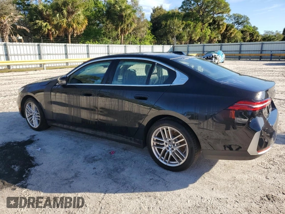 2024 BMW 5 Series 530i with VIN WBA43FJ09RCR17036, listed as a Copart auction lot 85694394 with 11,900 mi miles and Non Repairable. Bid and sale history available at carsss.com. Image 2.
