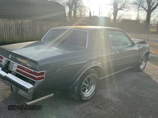 1987 Buick Regal with VIN 1G4GJ11Y4HP413978, listed as a Copart auction lot 87311954 with 52,519 mi miles and Salvage Title. Bid and sale history available at DreamBid. Image 4.