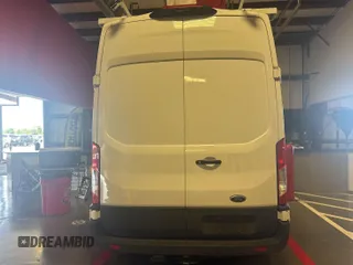 2023 Ford Transit Cargo with VIN 1FTBR1X86PKC09421, listed as a IAAI auction lot 42843981 with 10,233 mi miles and . Bid and sale history available at DreamBid. Image 18.