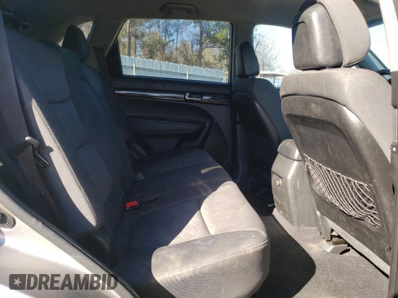2013 Kia Sorento LX с VIN 5XYKT3A69DG423616, выставлен на аукционе Copart как лот 42883765 с пробегом 207 984 миль миль и Списание • Salvage title. История ставок и продаж доступна на DreamBid. Изображение 11.