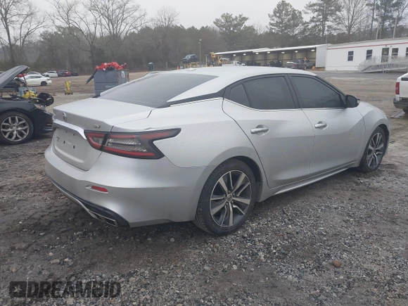 2019 Nissan Maxima Platinum z VIN 1N4AA6AV6KC372254, wystawiony jako IAAI lot #41519515 z przebiegiem 124 326 mil mil oraz . Historia ofert i sprzedaży dostępna na DreamBid. Obrazek 4.