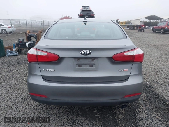2014 Kia Forte EX with VIN KNAFX4A8XE5213014, listed as a IAAI auction lot 41000589 with 89,890 mi miles. Bid and sale history available at carsss.com. Image 16.