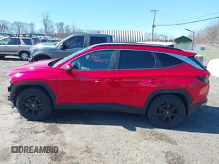 2022 Hyundai Tucson SEL z VIN 5NMJBCAE6NH157310, wystawiony jako IAAI lot #41938479 z przebiegiem 48 929 mil mil oraz . Historia ofert i sprzedaży dostępna na DreamBid. Obrazek 14.