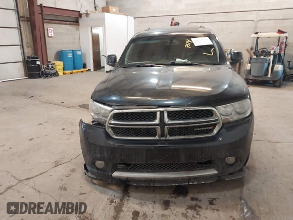 2013 Dodge Durango Crew z VIN 1C4RDJDG7DC661411, wystawiony jako IAAI lot #41617514 z przebiegiem 145 309 mil mil oraz . Historia ofert i sprzedaży dostępna na DreamBid. Obrazek 12.