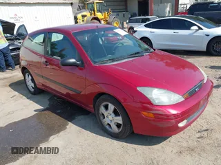 2003 Ford Focus ZX3 with VIN 3FAHP31323R119865, listed as a IAAI auction lot 42738163 with 64,008 mi miles and . Bid and sale history available at DreamBid. Image 1.