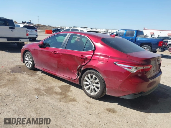 2019 Toyota Camry LE with VIN 4T1B11HK4KU725075, listed as a IAAI auction lot 41781275 with 156,856 mi miles and . Bid and sale history available at DreamBid. Image 3.