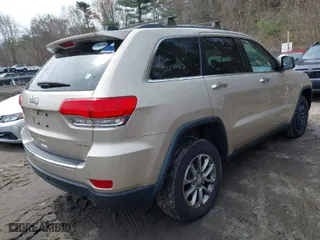 2014 Jeep Grand Cherokee Limited with VIN 1C4RJFBGXEC356754, listed as a IAAI auction lot 41961186 with 226,002 mi miles. Bid and sale history available at carsss.com. Image 4.
