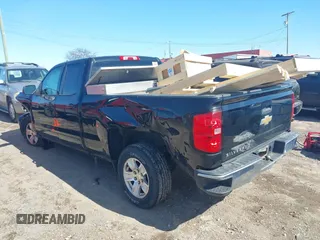 2015 Chevrolet Silverado 1500 LT with VIN 1GCRCREH3FZ206158, listed as a IAAI auction lot 41610695 with 182,692 mi miles. Bid and sale history available at carsss.com. Image 3.