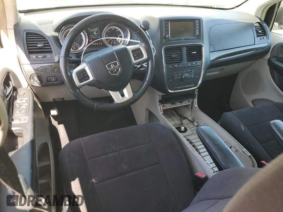 2011 Dodge Grand Caravan Crew with VIN 2D4RN5DG4BR699707, listed as a Copart auction lot 52055425 with 144,904 mi miles and Salvage Title. Bid and sale history available at DreamBid. Image 8.