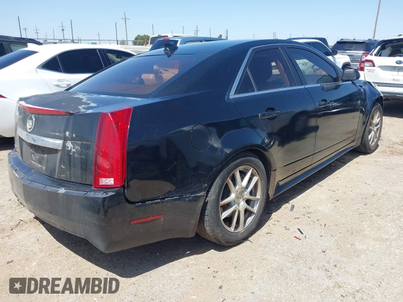 2013 Cadillac CTS Sedan Luxury with VIN 1G6DE5E55D0169928, listed as a IAAI auction lot 41965726 with 160,595 mi miles. Bid and sale history available at carsss.com. Image 4.