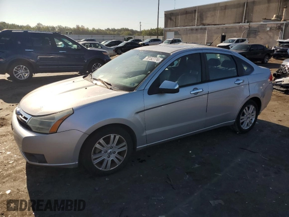 2010 Ford Focus SEL with VIN 1FAHP3HN8AW216909, listed as a Copart auction lot 70152774 with 124,521 mi miles and Clean Title. Bid and sale history available at carsss.com. Image 1.