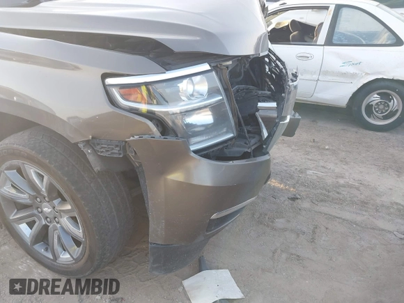 2015 Chevrolet Suburban LTZ with VIN 1GNSKKKC1FR628182, listed as a IAAI auction lot 41801391 with Not Provided miles and . Bid and sale history available at DreamBid. Image 1.