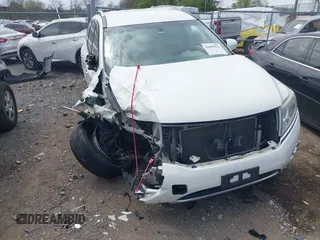 2016 Nissan Pathfinder S with VIN 5N1AR2MN0GC637700, listed as a IAAI auction lot 41899423 with Not provided miles and . Bid and sale history available at DreamBid. Image 6.