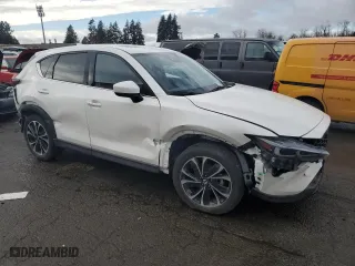 2022 Mazda CX-5 2.5 S Premium Package with VIN JM3KFBDM9N1534431, listed as a Copart auction lot 45612095 with 29,667 mi miles and Salvage Title. Bid and sale history available at carsss.com. Image 4.