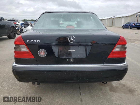 1997 Mercedes-Benz C z VIN WDBHA23EXVF560999, wystawiony jako Copart lot #74100944 z przebiegiem Nie podano mil oraz Nie do naprawy • Non repairable. Historia ofert i sprzedaży dostępna na DreamBid. Obrazek 6.